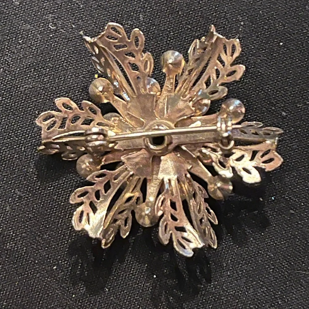 Vintage Gold Tone Snowflake Starburst Brooch Blue and Clear rhinestones